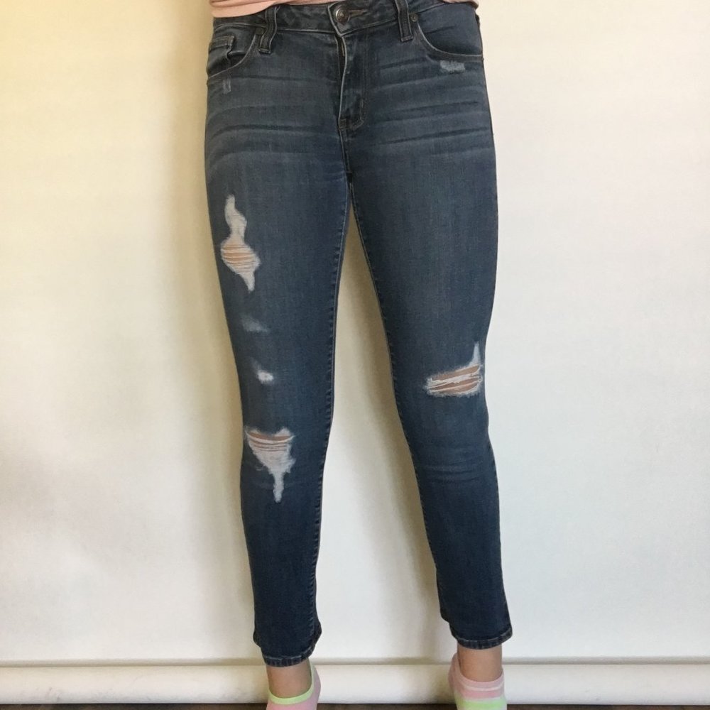 SKINNY RIPPED JEANS